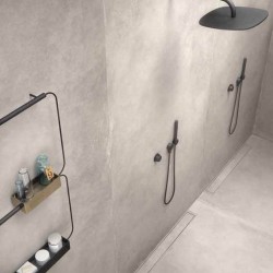 Грандиозен гранитогрес за баня в сив цвят с ефект кожа WORN STONE от Ariana Ceramica (Италия)
